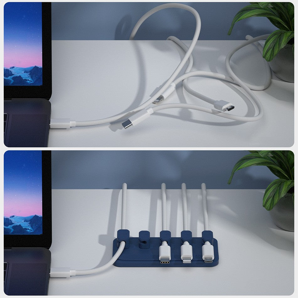 751f76ab3c7e534126f02d505673d6feCharging cable wire holder with multiple ports for organized cable management on a desktop.