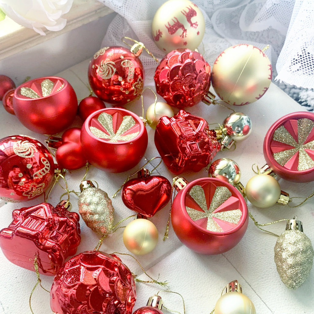 Christmas Ball Ornaments for Holiday Tree Decor hanging on a snow-covered Christmas tree.