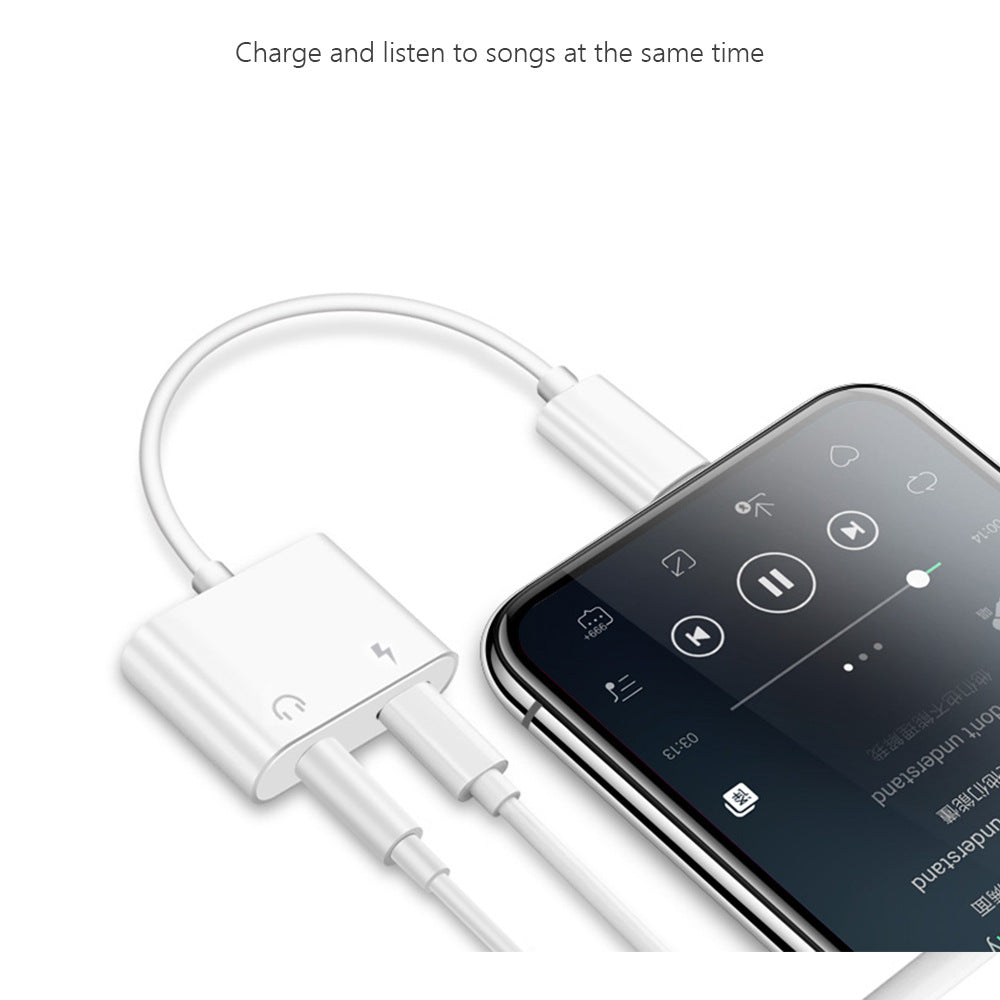 8-in-1 phone audio adapter connected to smartphone, allowing charging and audio playback simultaneously.
